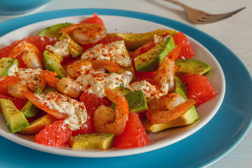 Salad - a mix of avocado, shrimp and grapefruit.