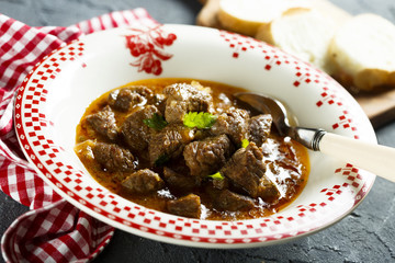 Classic beef goulash with tomatoes