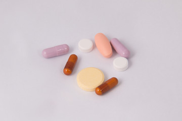 Isolated multi color of pills.