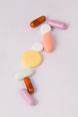 Isolated multi color of pills.