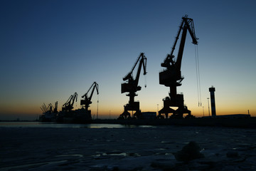 Port crane for work in the sunset