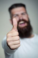 Bearded man with super gesture