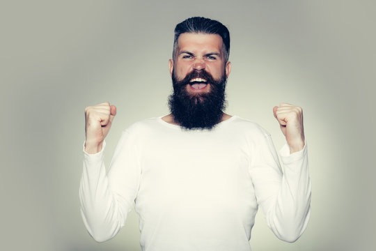 Bearded man with happy yes gesture
