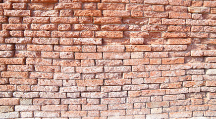 red brick wall of old chipped in an House