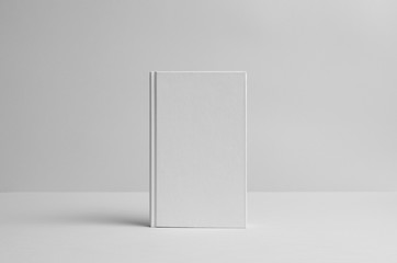Hardcover Canvas Book Mock-Up - Front. Wall Background