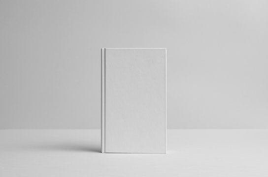 Hardcover Canvas Book Mock-Up - Front. Wall Background