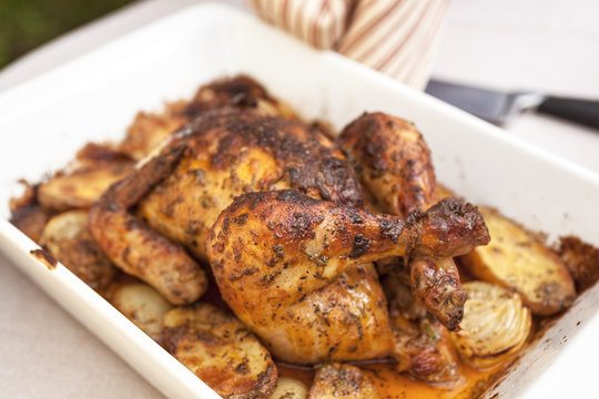 homemade roast chicken, horizontal, white tray