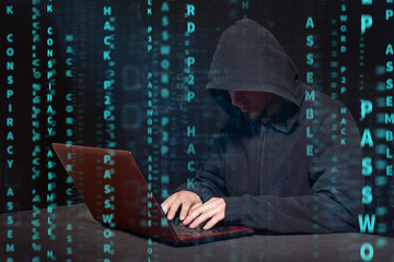 hacker at work with graphic user interface around