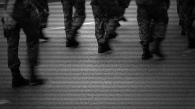 Marching soldiers on the street.