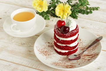 red cake with cherry