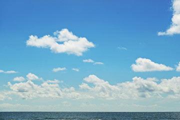 Fototapeta na wymiar Beautiful blue sky over North Sea