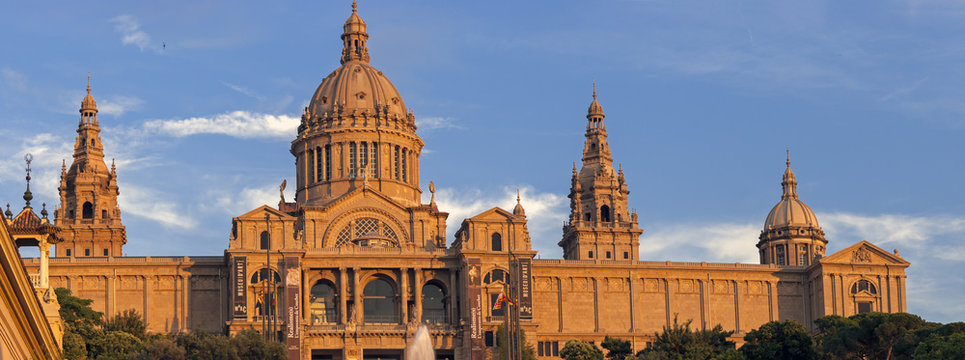 Large panoramic view of National Palace in Barcelona at sunset