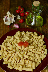 cooked penne rigate, tomato, garlic and olive oil
