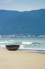 Bamboo fishing boat at the China Beach in Danang Vietnam