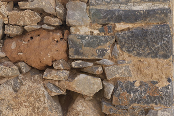 Wall from large stone textured basalt. Good background for wallpaper.