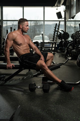 Fototapeta na wymiar Muscular Man Resting After Exercise