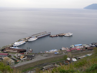 Pier and boats in Port Baikal. Irkutsk region. Siberia.