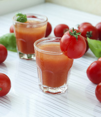 Cocktail Bloody Mary in cold glasses on a white background