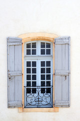 Picturesque window in historic center of Avignon, Provence
