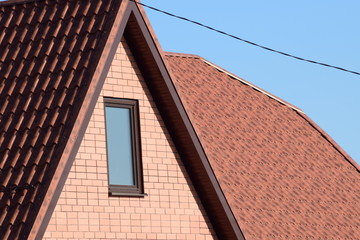 Fototapeta premium House with a roof made of metal sheets