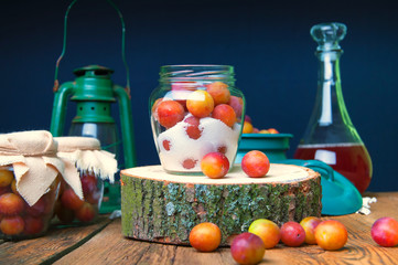 Preparation of plums with sugar in jars for winter