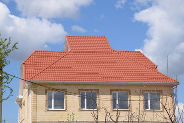 House with a roof made of metal sheets