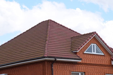 House with a roof made of metal sheets