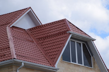 House with a roof made of metal sheets