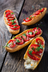 Bruschetta with tomatoes and greens