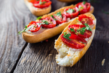 Bruschetta with tomatoes and greens