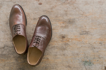 leather shoes on old wood background