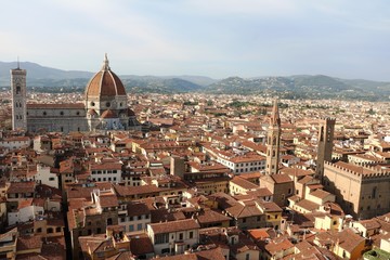 Fototapeta na wymiar Badia Fiorentina and Santa Maria del Fiore in Florence, Tuscany Italy 