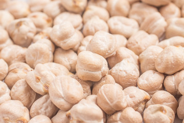 Close-up on a raw Chickpeas in white background. 