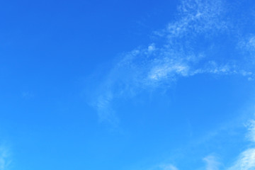 Blue sky with cirrus clouds.