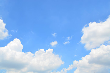 Blue sky with white fluffy clouds