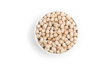 Raw Chickpeas into a bowl in white background. 