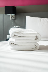 Fototapeta na wymiar Towel on bed