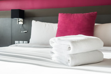 Fototapeta na wymiar Towel on bed