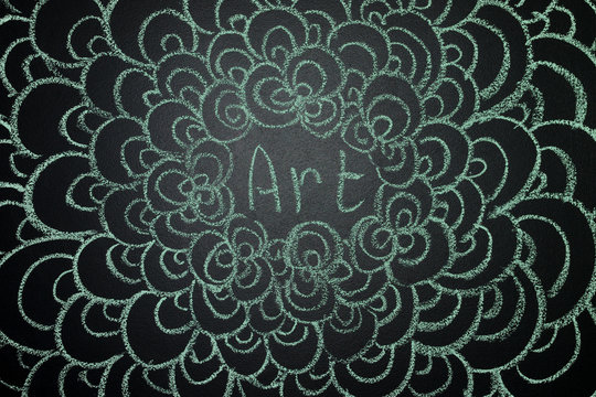 Art, written with chalk on a blackboard