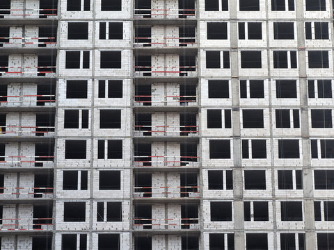 Lots of windows in high-rise building under construction