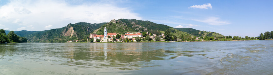 Panoramic view of Danube river and town of Durnstein with abbey and old castle, Wachau valley, Lower Austria