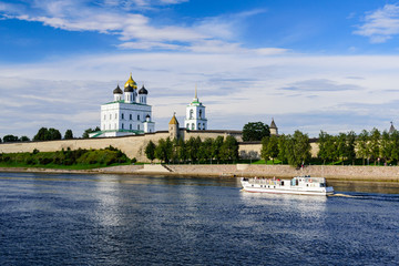 Fototapeta na wymiar The ancient fortress on the bank of the river, Pskov Kremlin, Russia.