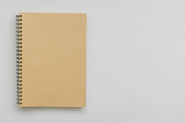 notebook with wooden background, Working desktop concept idea, Vintage tone filter