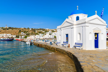 Typical Greek white church building in Mykonos port, Mykonos island, Greece