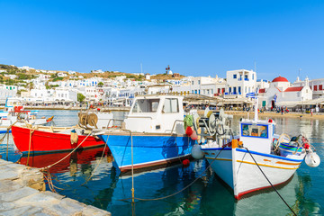 Fototapeta na wymiar Colorful traditional fishing boats in Mykonos port, Mykonos island, Greece