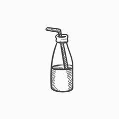 Glass bottle with drinking straw sketch icon.