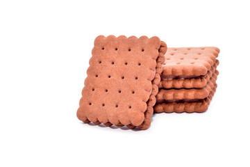 Brown biscuits with chocolate isolated on white