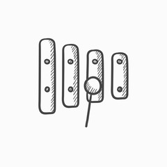 Xylophone with mallet sketch icon.
