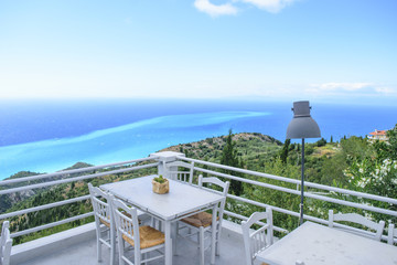 Luxury terrace balcony of exclusive seaside resort with fancy ta