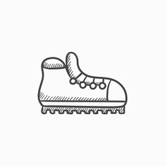 Hiking boot with crampons sketch icon.
